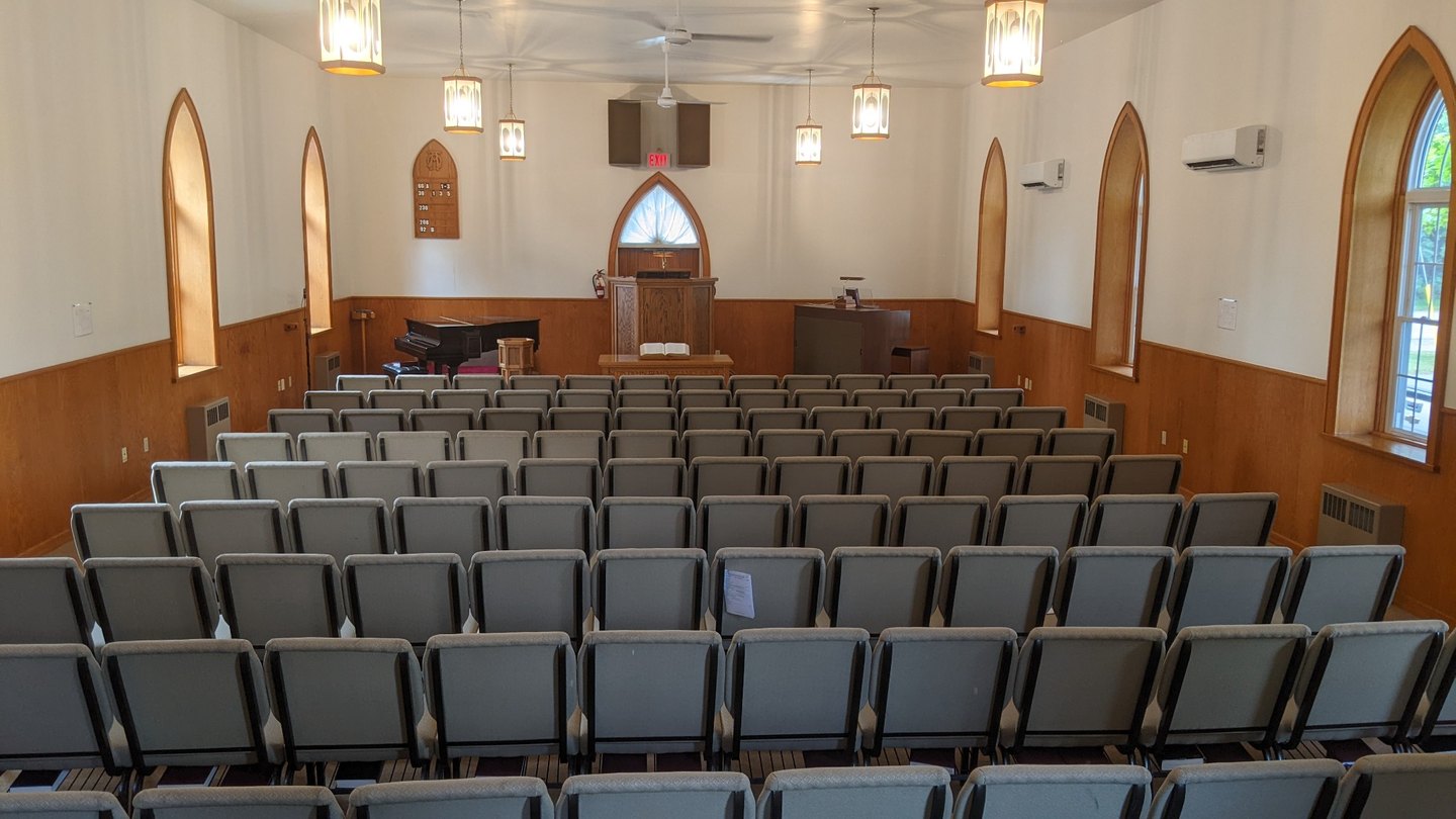 Interior of Salem United Reformed Church looking toward the pulpit and communion table